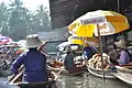 Damnoen Saduak floating market is a floating market  outside of Bangkok