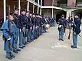 Civil War re-enactors wearing shell jackets, kepis and greatcoats