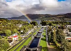 Locks on Caledonian Canal in Fort Augustus, Loch Ness in the background