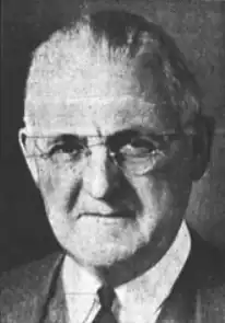 Image of publisher Frank Gannett, smiling, wearing glasses, published in the year 1940.