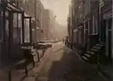 Amsterdammertjes in an Amsterdam street, in the painting Backlight Langestraat (1993) by Frans Koppelaar