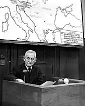 Photograph of Halder sitting in a witness box looking to his right