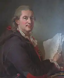 A man in his late 50s wearing a powdered 18th-century style wig. His body is facing to the right. His face has a resolute expression and is turned toward the viewer. His right arm is propped on a table with plotting tools and a book at the bottom of the painting and is holding up several white sheets of paper. He is wearing a large jacket or coat in a purple nuance with a red lingin and with red and blue designs on the sleeves and small of the back. The jacket is in the traditional style of the Sami people of northern Scandinavia.