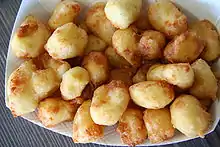 A close-up view of deep-fried cheese curds