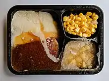 Coloured image of frozen tv dinner