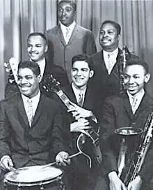 Funk Brothers in early 1960s. Left to right: Benny Benjamin, James Jamerson, Joe Hunter, Larry Veeder, Hank Cosby, Mike Terry