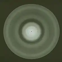 Experimental gas electron diffraction pattern, showing diffuse rings.