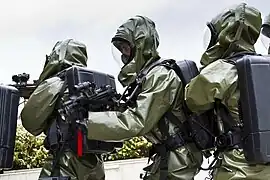 GIGN operators in NBC suits during a NATO CBRN defense exercise