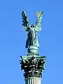 The top of the column depicts Archangel Gabriel, who holds the Hungarian Holy Crown and the apostolic double cross in his hands