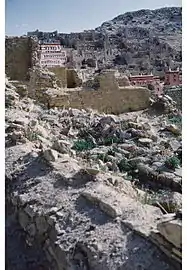 1985 photo of a portion of Ganden Monastery ruins (with some new buildings) destroyed by the People's Liberation Army in 1959, after Tibetan's March 10th Lhasa protest and the flight to exile of the 14th Dalai Lama of Tibet.