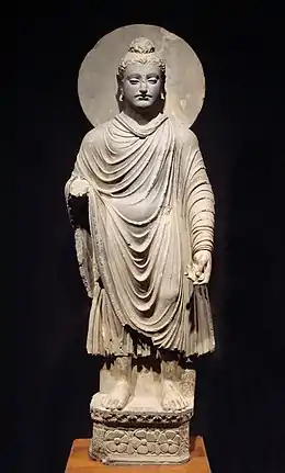 Rosette design at the bottom of a statue of the Buddha, circa 1st century CE. Greco-Buddhist art found in Gandhara