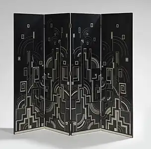 Screen by Gaston Suisse, Black Chinese lacquer and graphite inlays. Abstract geometric decor in silver lacquer.circa1925, Exposition: 1925, Quand L'art Déco séduit le monde.Cité de l'architecture, Palais de Chaillot, Paris