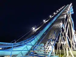 Steel structure illuminated by lights at night