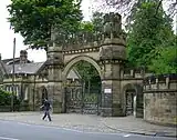 Victorian Gothic Revival gateway arch and pedestrian entrance to the park in which the museum is located.