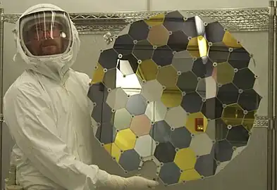 A Genesis collector array in the clean lab at Johnson Space Center. The hexagons consist of a variety of ultra-pure, semiconductor-grade wafers, including silicon, corundum, gold on sapphire, diamond-like carbon films, and other materials.