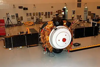 The spacecraft in the Payload Hazardous Servicing Facility, with both solar arrays deployed