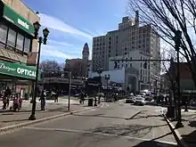 Busy downtown area with a narrow street