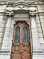 One of the decorated wooden doors of the Synagogue.