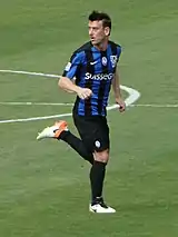 Gianpaolo Bellini in an Atalanta home kit