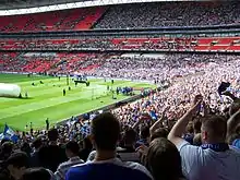 Gillingham fans celebrate after the match