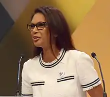 Colour photograph of Gina Miller speaking in Brighton in 2018