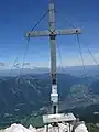 Summit cross on the Alpspitze with its summit register