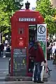 A Glasgow police box (red variation of a Mackenzie Trench) near the Glasgow Royal Concert Hall serving as a hemp dispensary