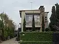 Glenunga Flats, Armadale. Completed in 1941; Frederick Romberg and Mary Turner Shaw, architects. A hybrid of Functionalist components with folksy, 'European Chalet Style’ materials.[89]