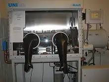 An ordinary glovebox, showing the two gloves for manipulation, with airlock on the right