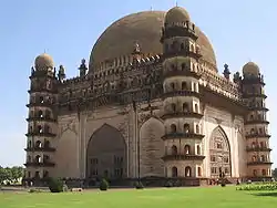 7-storey domed building with 4 domed corner towers