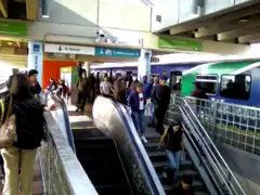 Passengers exit a northbound Metrorail train during rush hour