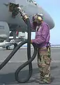 Fuel personnel wear purple and are affectionately known as "grapes".