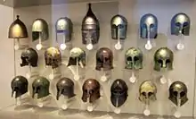 Types of Ancient Greek helmets; top line, third from the left: Illyrian type helmet. Antikensammlung in Altes Museum, Berlin.