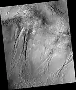 Group of gullies in Thaumasia quadrangle, as seen by HiRISE under the HiWish program.