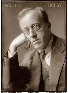 middle-aged man in head and shoulder shot looking at camera