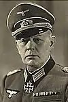 A man wearing a military uniform.