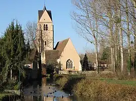 The church in Gy-les-Nonains, with a tributary of the Ouanne