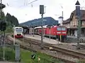 Electric and diesel trains meet at Neustadt