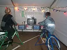 hackers playing a bicycle-powered video game