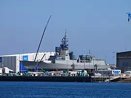 Colour photograph of a large ship out of the water