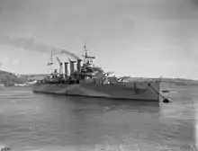 Black and white photograph of a warship