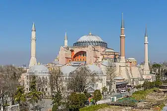 Large building with dome and four spires