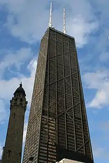 John Hancock Center in Chicago by Fazlur Rahman Khan was the first building to use X-bracing to create the trussed-tube design.