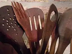 Wooden spoons and other utensils for frying.