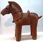 Haniwa horse statuette, complete with saddle and stirrups, 6th century, Japan