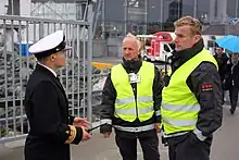 Securitas port security officers talking with a Harbourmaster in Norway