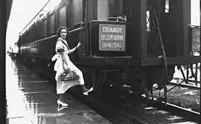 A woman boarding the Orange Blossom Special train c. 1930 in Sebring, Florida