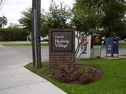 Sign indicating Hedwig Village