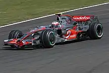 A racing car going around a corner