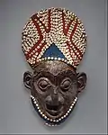 Royal mask; by artists of the Bamum people (Cameroon); before 1880; wood, copper, glass beads, raffia and shells; height: 66 cm; Metropolitan Museum of Art